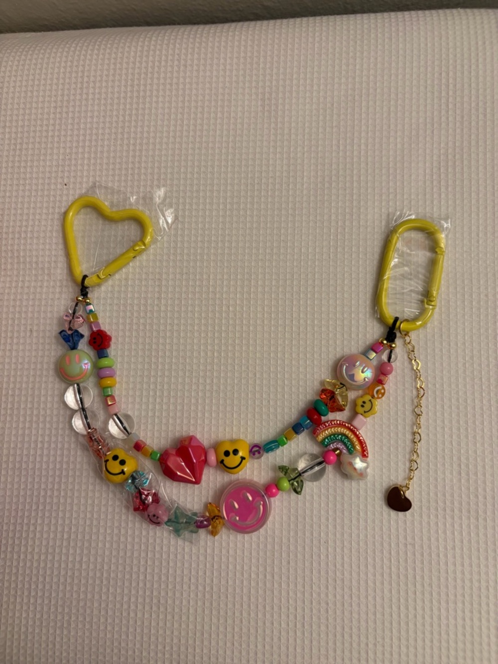 Kids Yellow Beaded Smile & Rainbow Accessory Strap. Bag charm